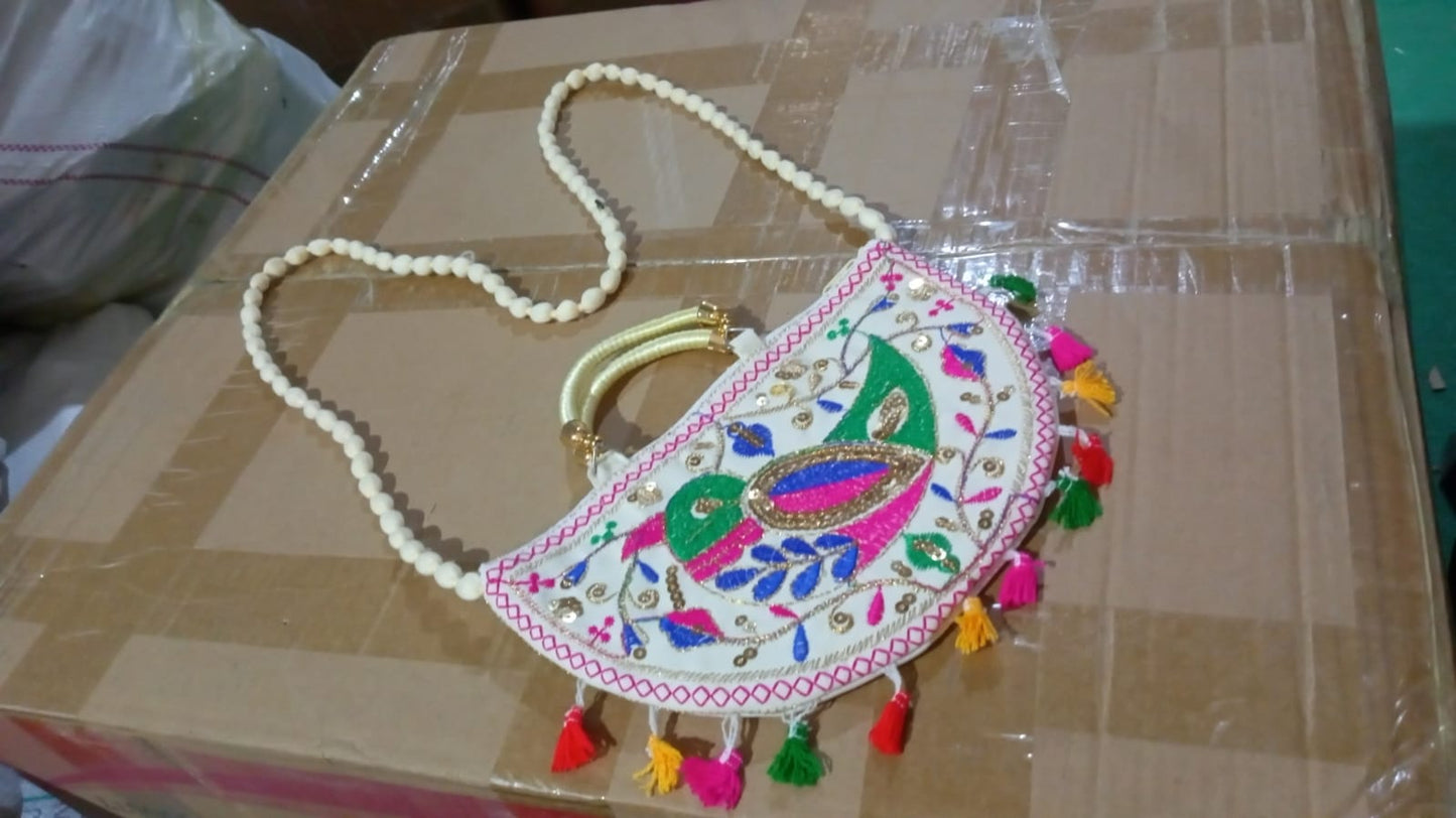 Lifestyle shot of the colorful Rajasthani handbag, perfect for everyday ethnic wear.