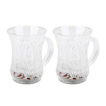 A set of flashing LED cups, showcasing their water-activated light feature in a dark setting.