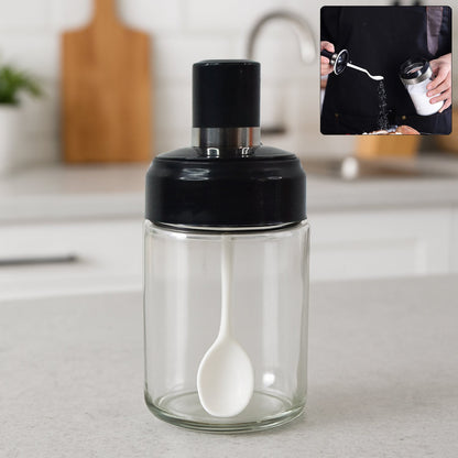 Transparent glass storage jar with built-in spoon, perfect for kitchen use