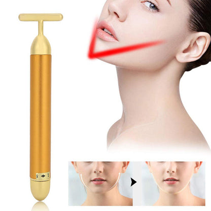 Golden Vibrating Face Massager tool for radiant skin.