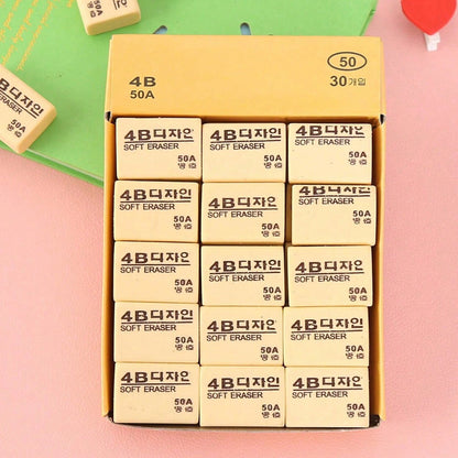 Thirty bright yellow 4B erasers neatly packaged for students and office use.
