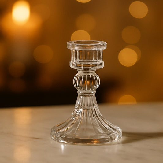 Elegant crystal glass candle holder stand casting a warm glow