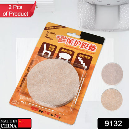 A person applying an adhesive-backed cork coaster to a surface as part of a DIY craft project.