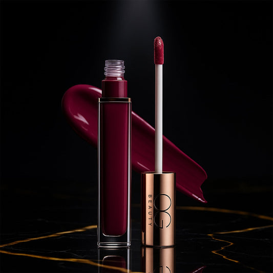 OG Beauty Vintage Wine Liquid Lipstick bottle with a gold cap.
