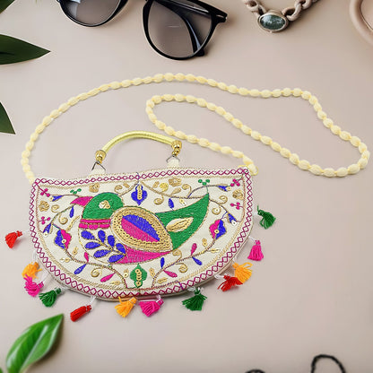 Vibrant Rajasthani Handbag with intricate multi-color embroidery on a light background.
