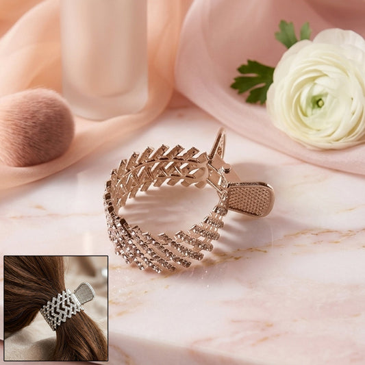 Elegant crystal-studded metal hair claw clip showing intricate design and sparkle