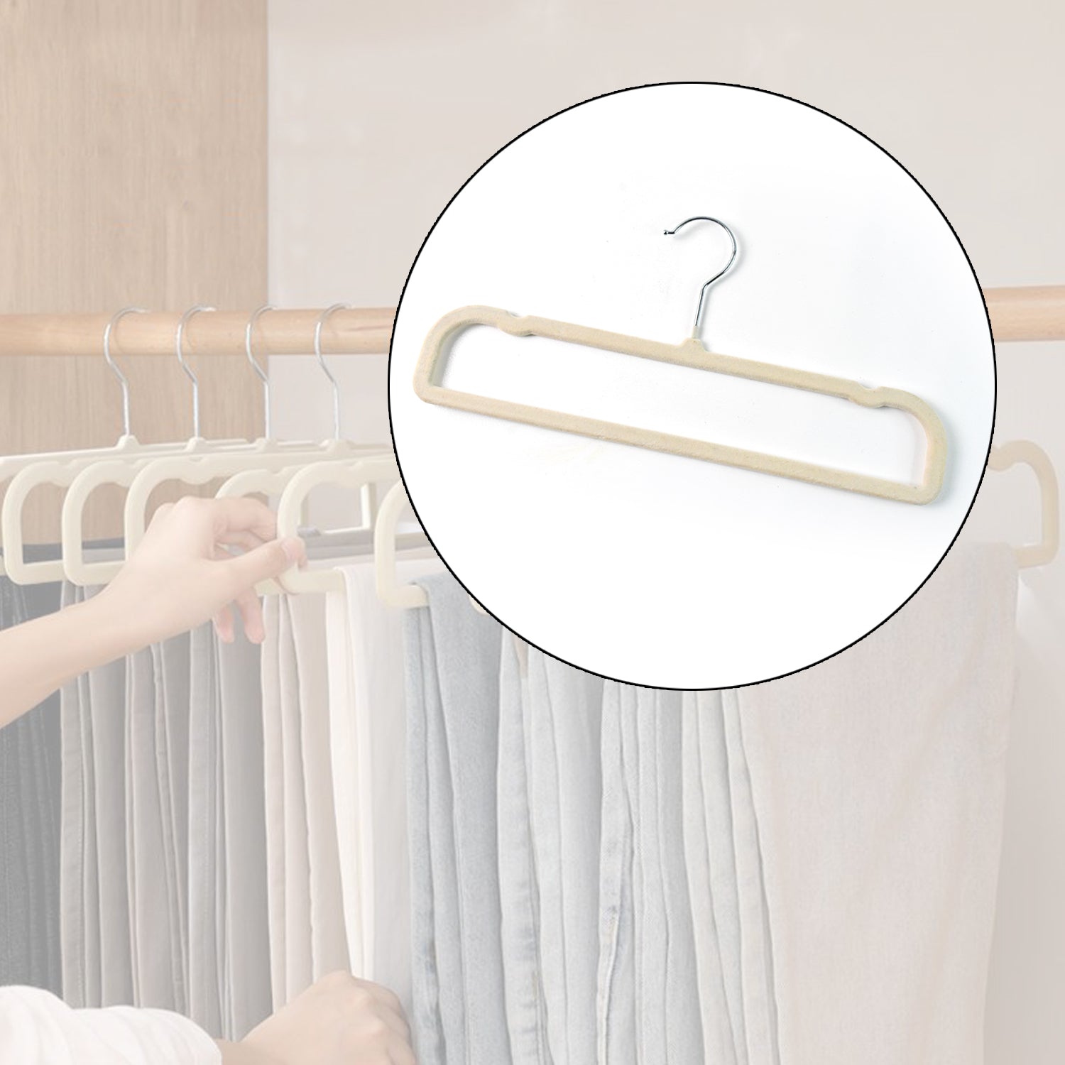 Metal hook attached to slim velvet cloth hanger for organized clothing storage