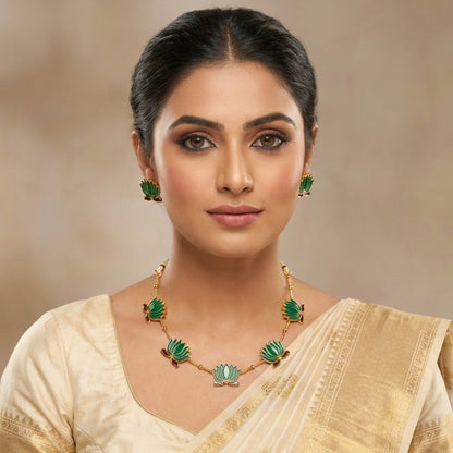 Jewellery set showing lotus motif necklace with matching studs