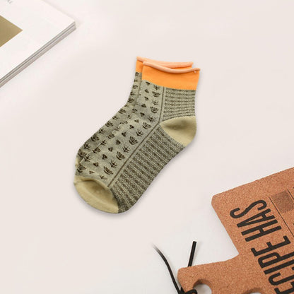 Top-down view of grey cotton ankle socks, perfect for breathable comfort.