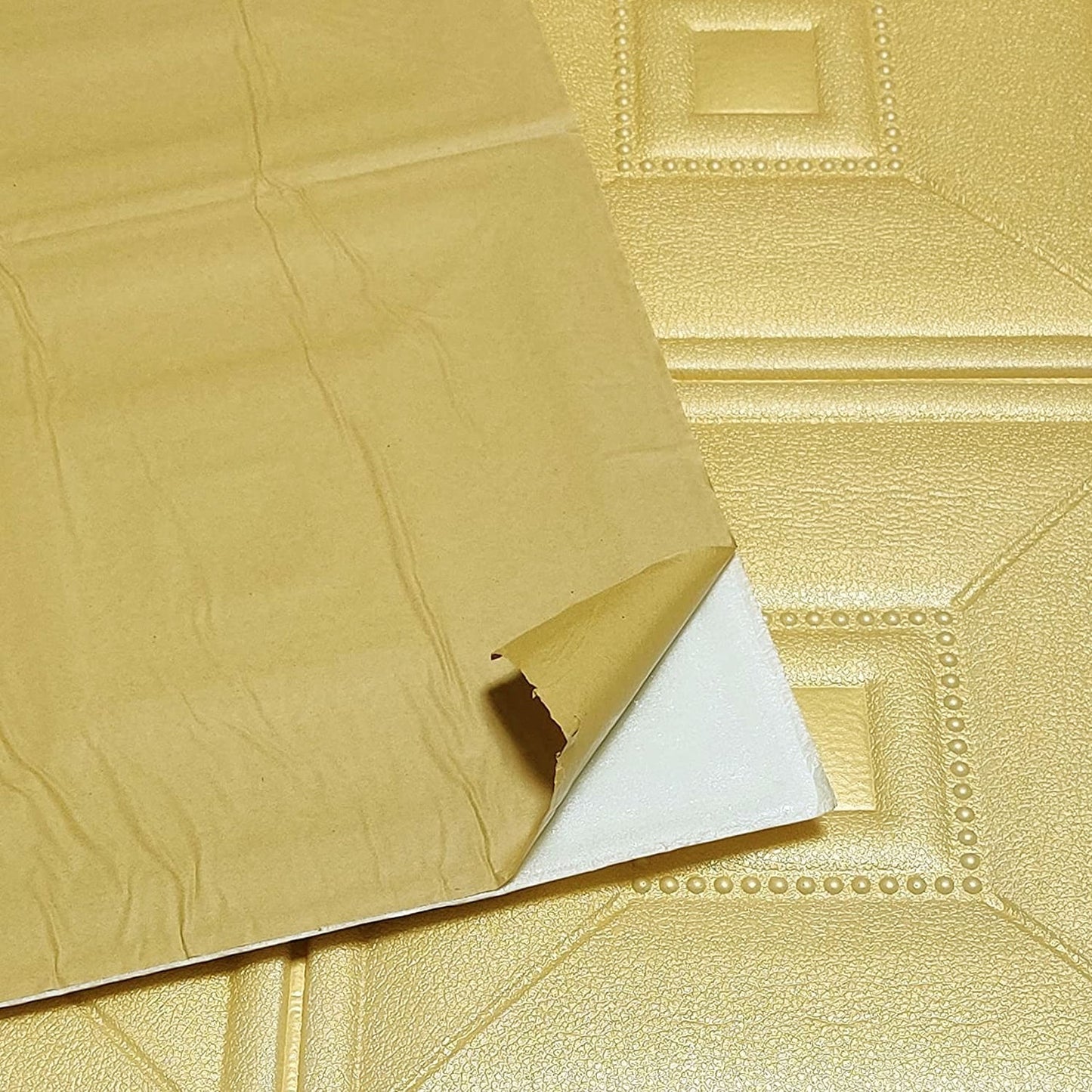 View of a single foam wallpaper sticker demonstrating its texture.