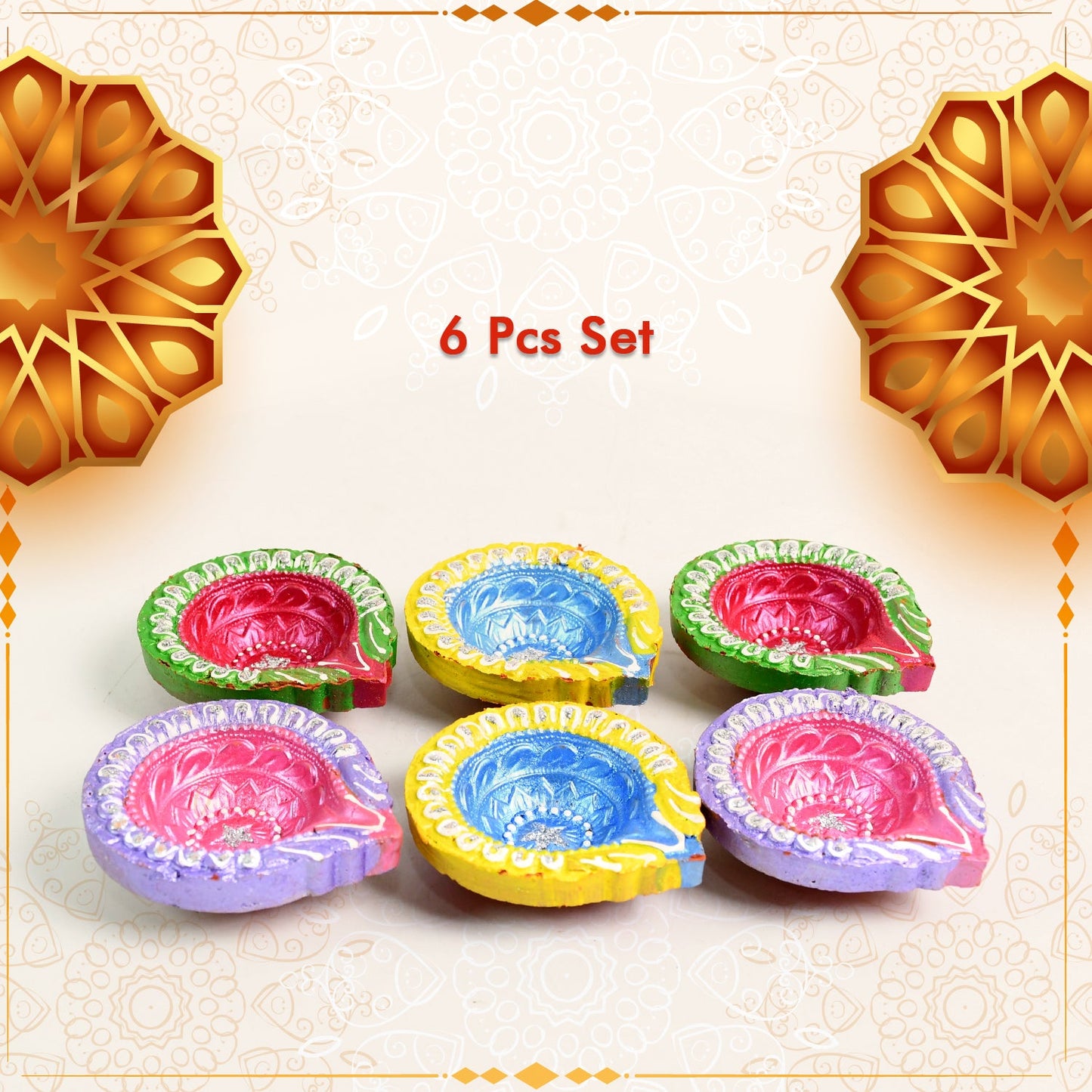 Assortment of colorful hand-painted clay diyas in a gift box, ideal for Diwali gifting.