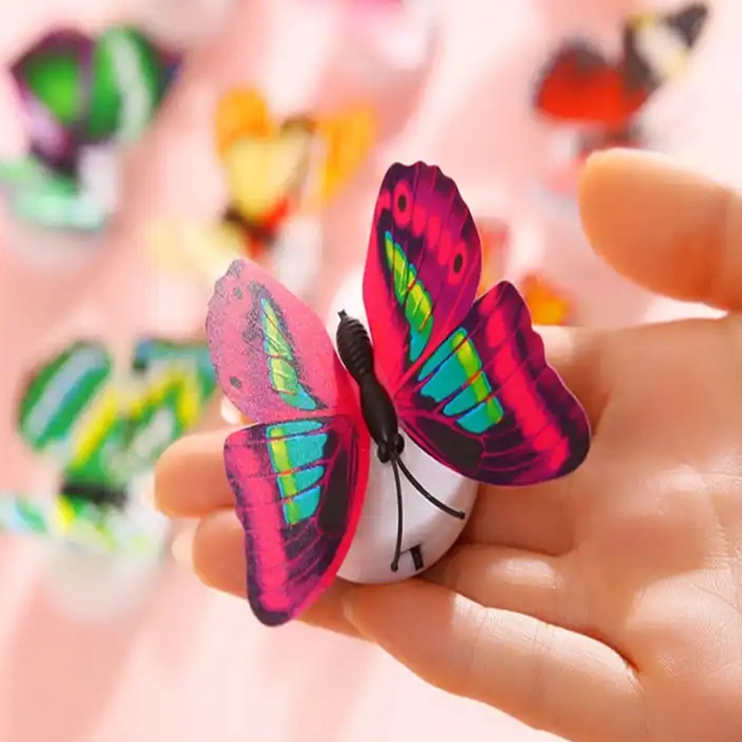 The mesmerizing 3D effect of the Butterfly Night Lamp in a dark room.