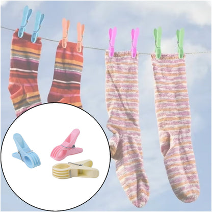 Pink plastic cloth clip securely holding fabric in place
