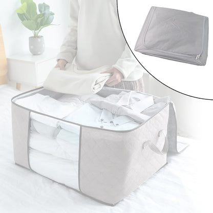 Storage box with window neatly organizing sarees and quilts inside wardrobe