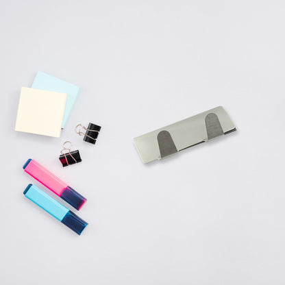Pack of six self-adhesive hooks for organising home essentials.