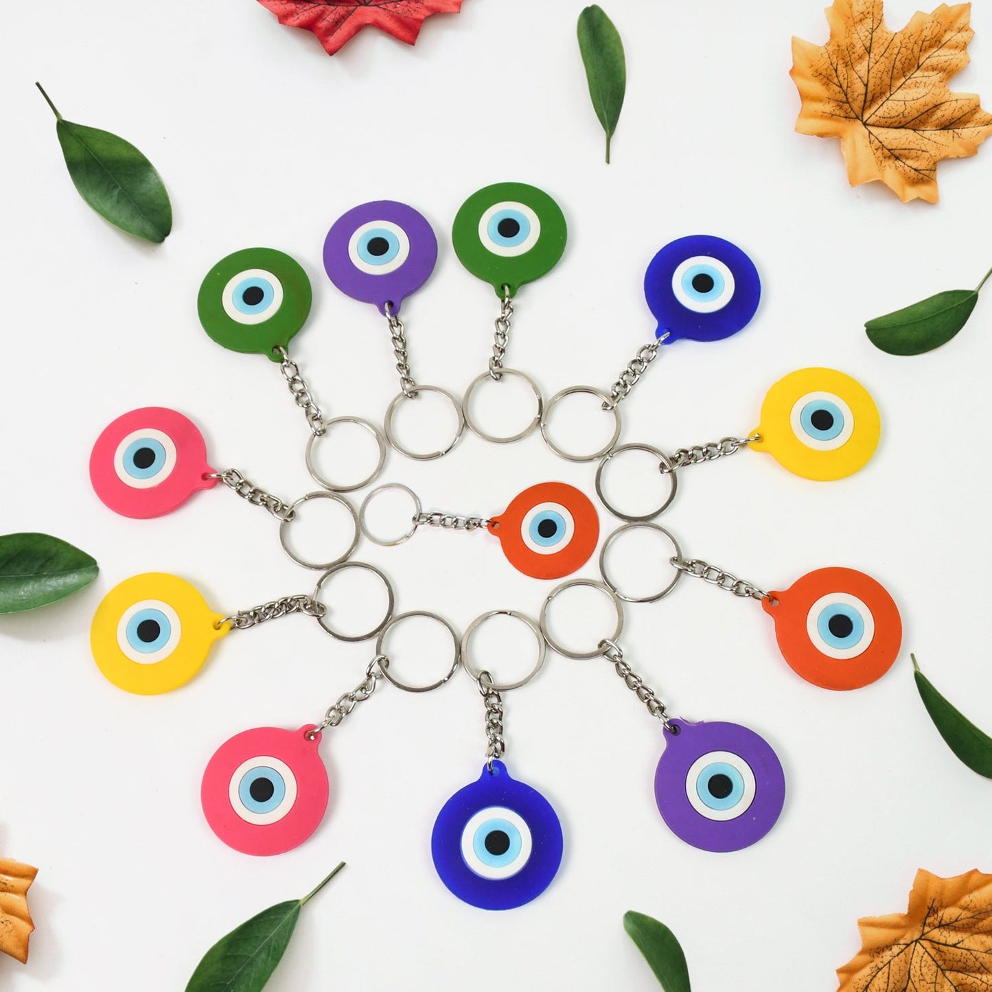 Evil eye silicone keychain in mixed blue tones by Styleva