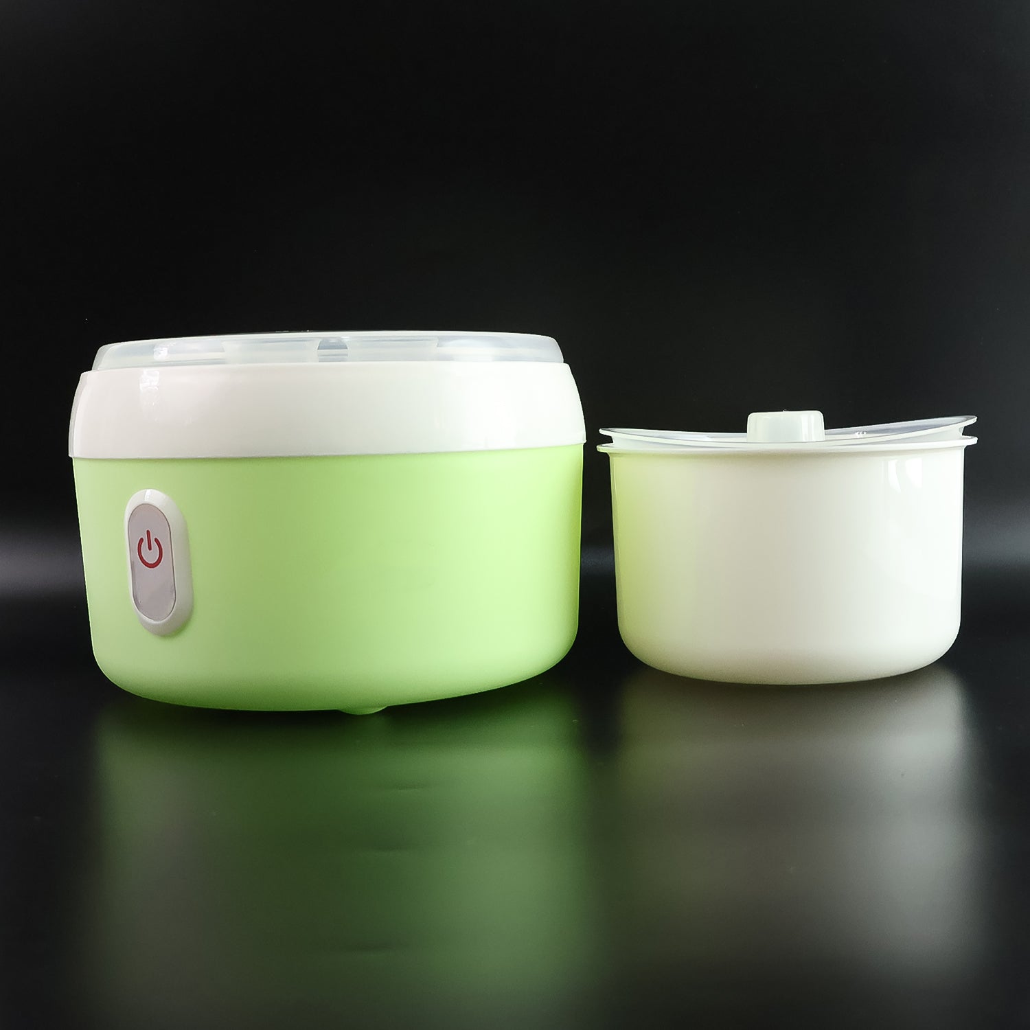 Side profile of the green electric yogurt maker, a versatile kitchen appliance.