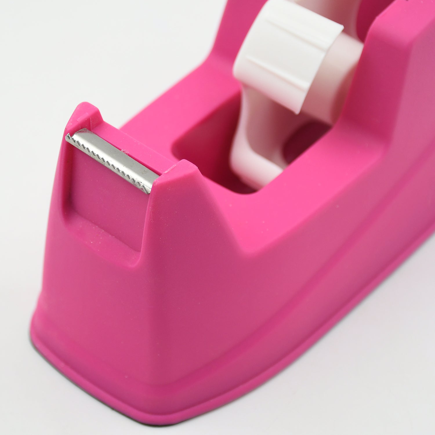 Hand holding the ergonomic tape dispenser, demonstrating comfortable use for sealing boxes.