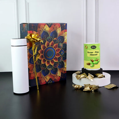 Stainless steel bottle included in festive kesar pista almonds gift set.
