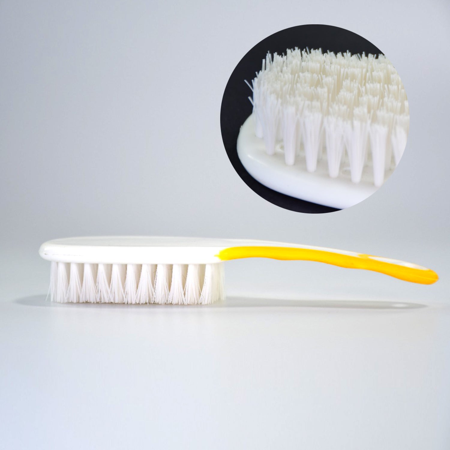 Top-down view of the Handle Grip Nail Brush, emphasizing its comfortable grip and functional design.