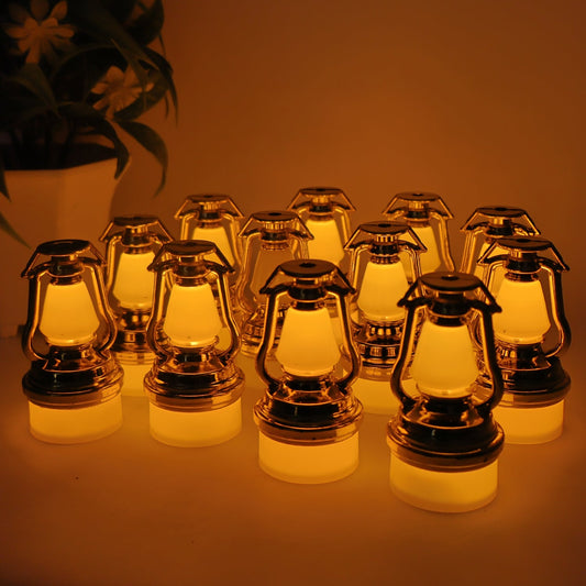 Set of 12 vintage lantern flameless LED candles emitting warm yellow light