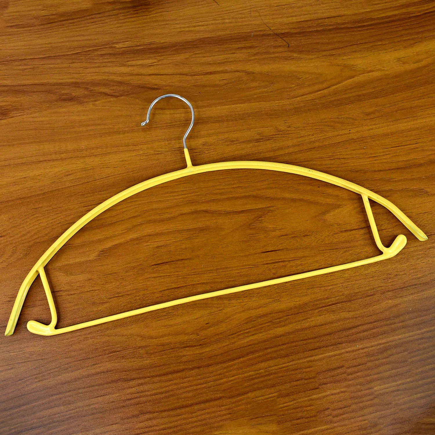 Slim metal hanger with space-saving design for clothes organization