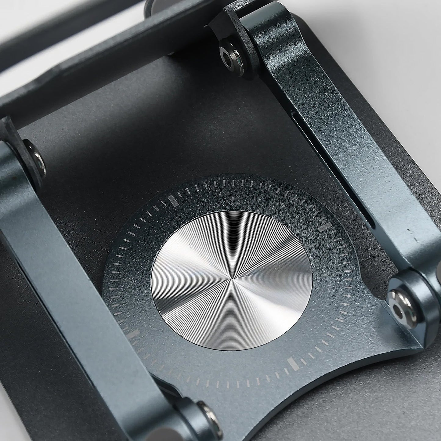 Side view highlighting the height adjustment feature of the ergonomic laptop stand.
