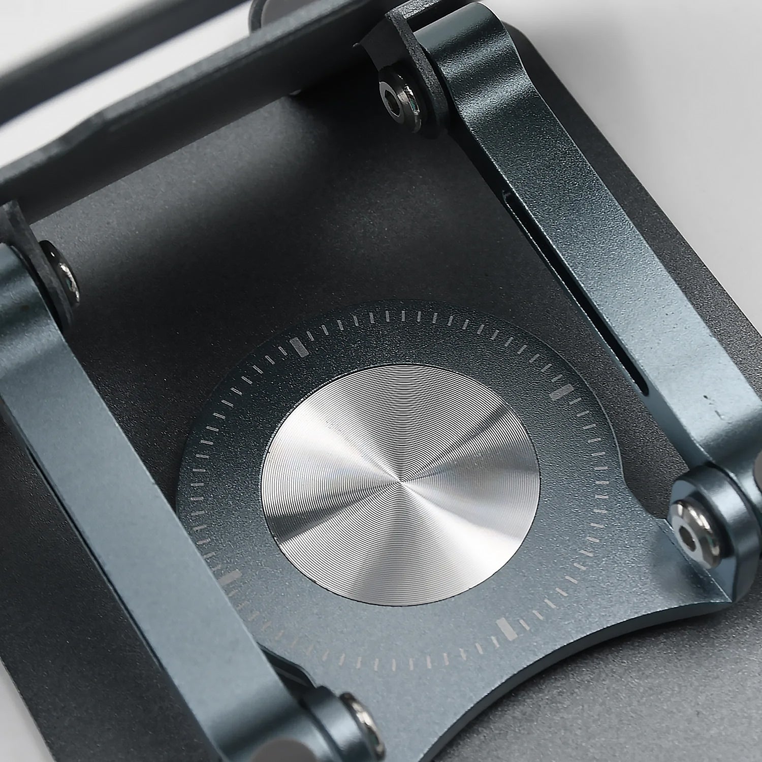 Side view highlighting the height adjustment feature of the ergonomic laptop stand.