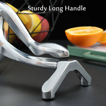 Close-up of the durable aluminium manual fruit juicer's pressing mechanism.