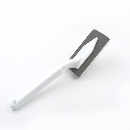 Multi-surface triangle cleaning tool for various household chores.