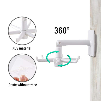 Close-up of the wide self-adhesive wall hook securely holding kitchen utensils.
