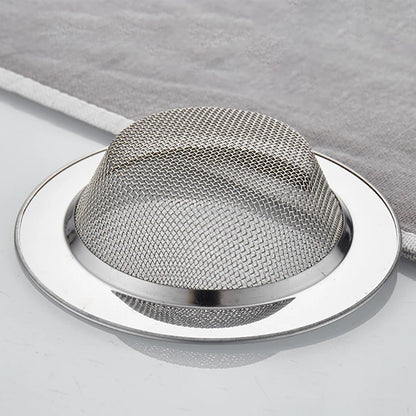 Side view of stainless steel dome-shaped drain hair catcher