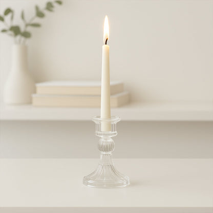 Crystal glass candle stand displaying stable base and clear glass