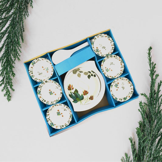 Elegant 9-piece pudding serving set arranged on a table.