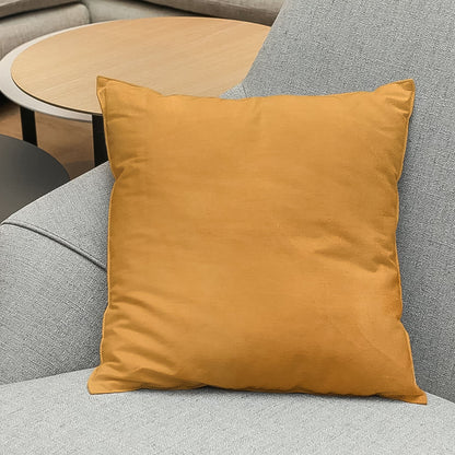 Stylish pillow cover adding a touch of elegance to bedroom decor.