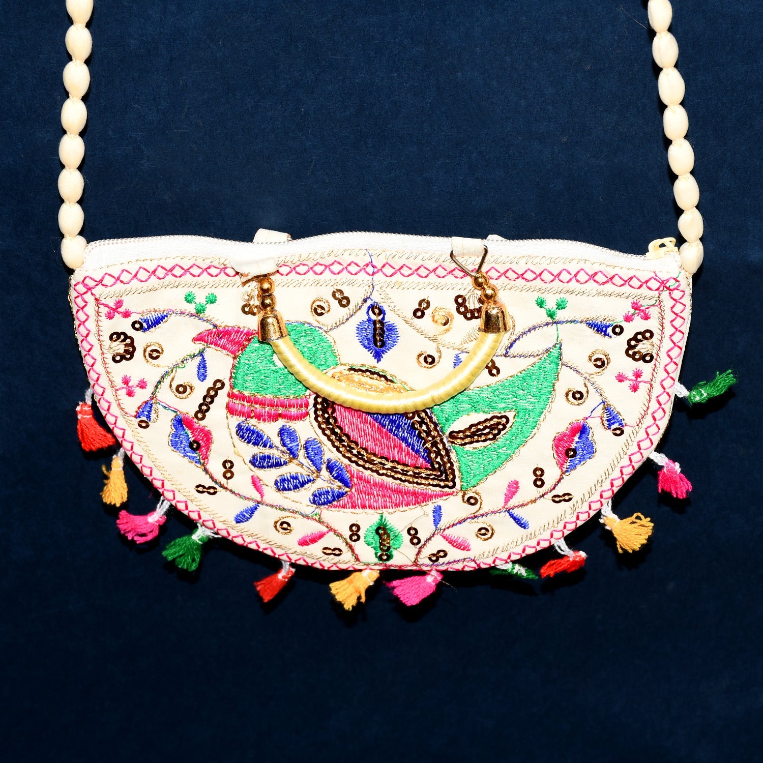 Side profile of the traditional Indian purse, showing its compact yet spacious design.