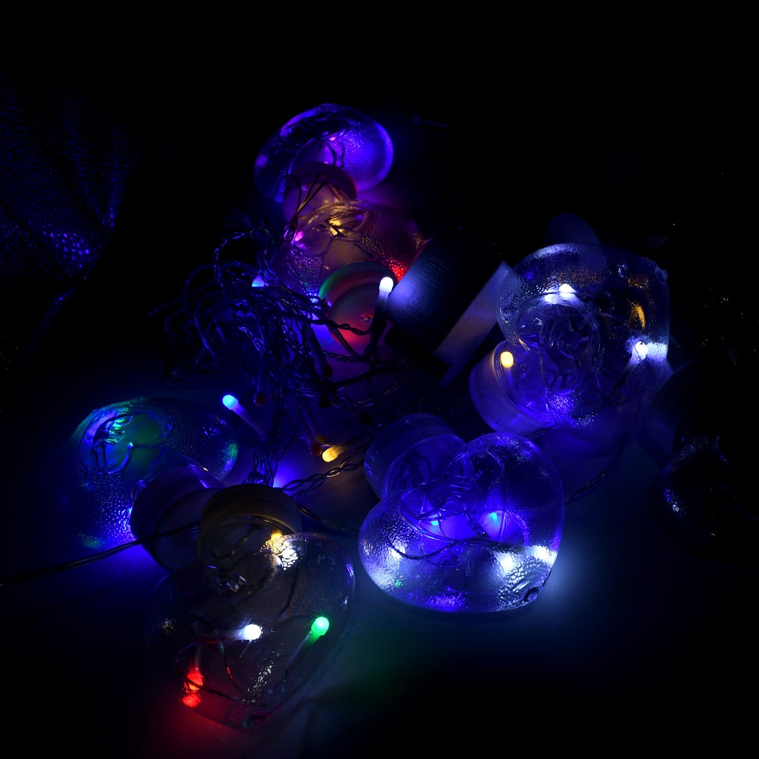 Colorful LED string lights with wishing balls arranged for a wedding decoration.