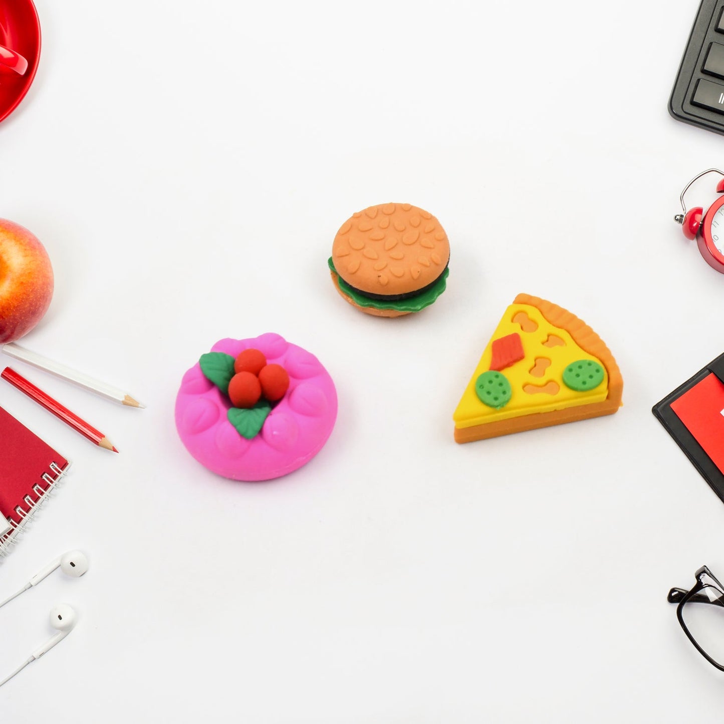 An overhead shot of the food-shaped eraser set, highlighting the variety of designs.