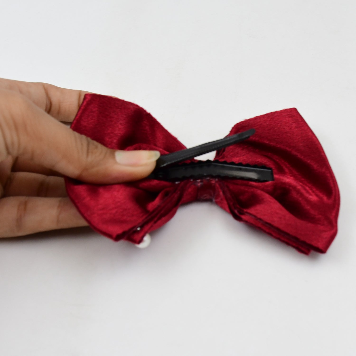 Back view of a secure metal hair clip mechanism.