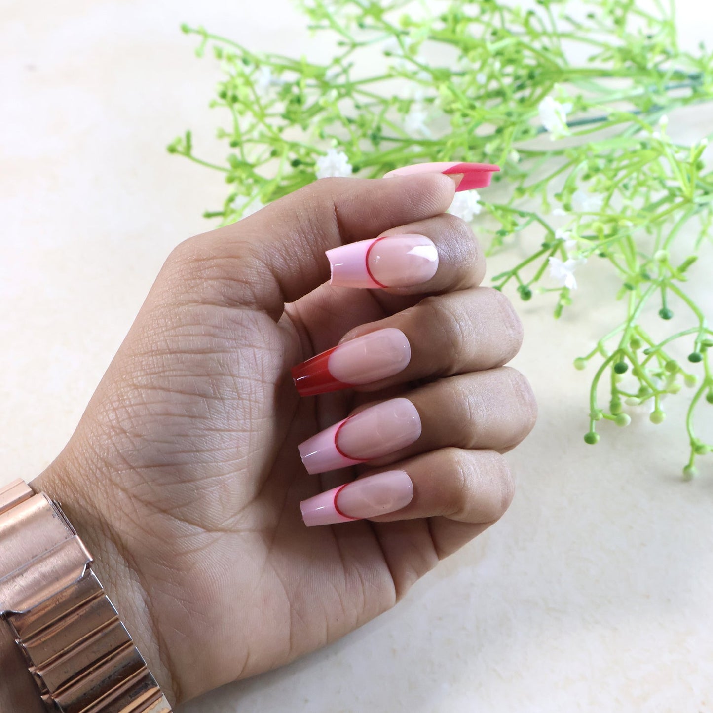 Glossy artificial nail tips in soft nude color for daily wear