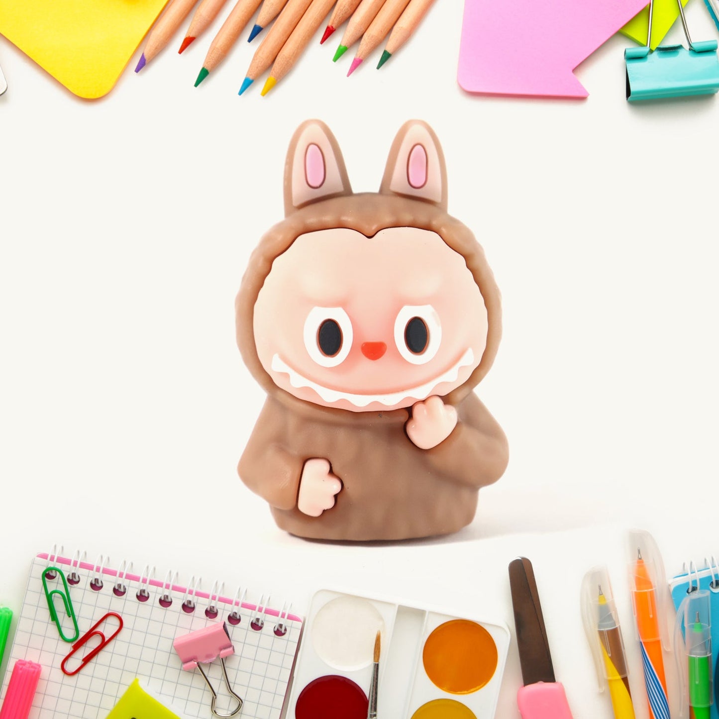 Child using cartoon pencil sharpener inside eraser for school
