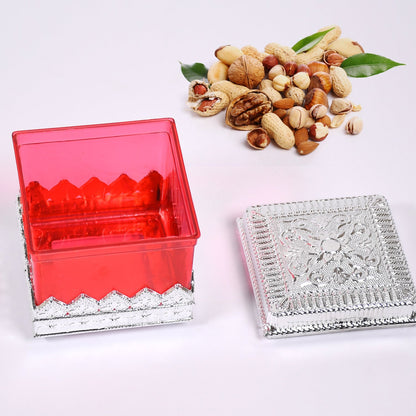 Close-up of the Ruby dry fruit storage container, highlighting its clear, BPA-free plastic.