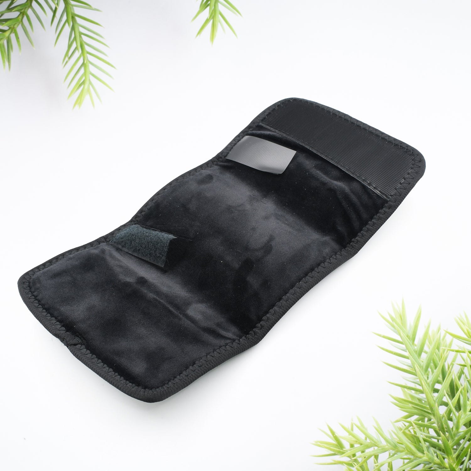 Versatile infrared heat strap with cable, offering pain relief for hand and wrist.