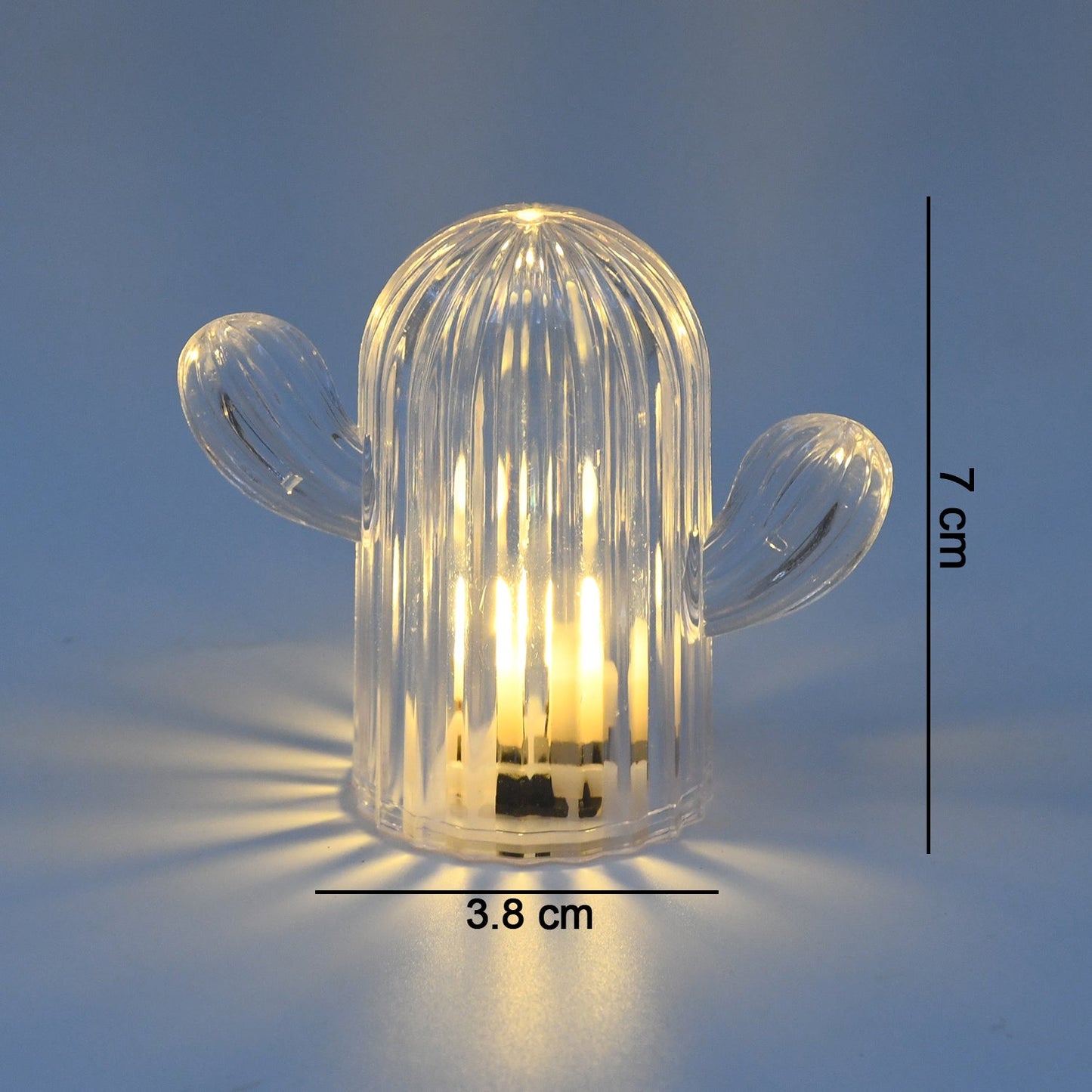 Detailed view of the top of a decorative night lamp in cactus shape, showing its LED bulb.