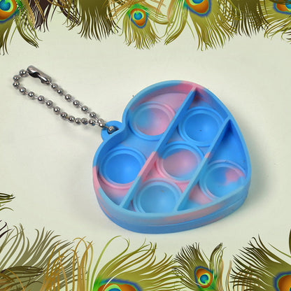 Collection of diverse mini fidget keychains in various shapes and colors, ready for everyday use.
