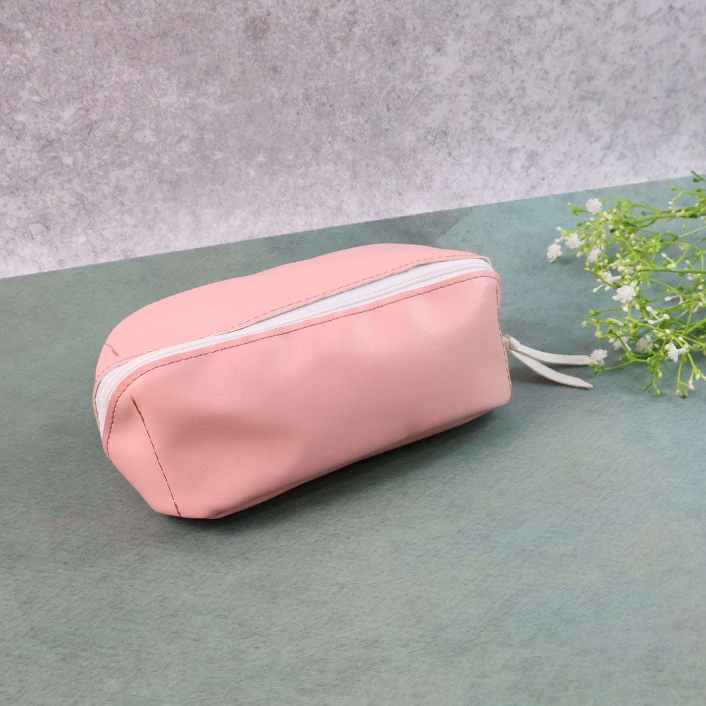 Stylish PU leather pouch in a vibrant colour, perfect for daily essentials.