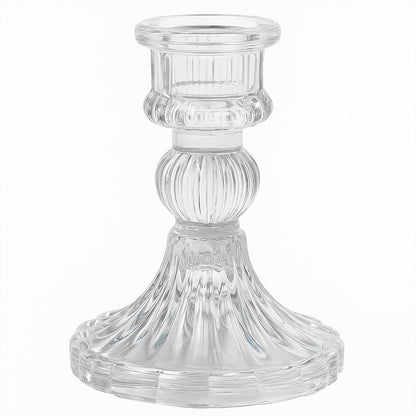 Transparent glass candle holder enhancing home decor ambiance