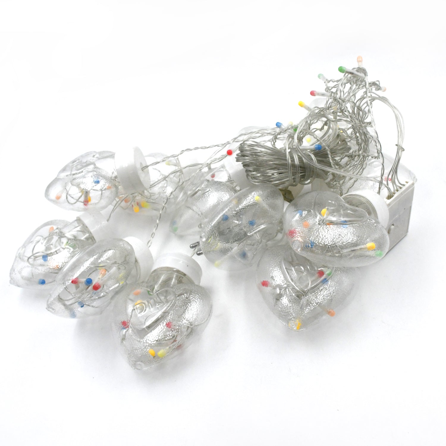 Bright LED wish ball lights creating a warm ambiance for an indoor celebration.