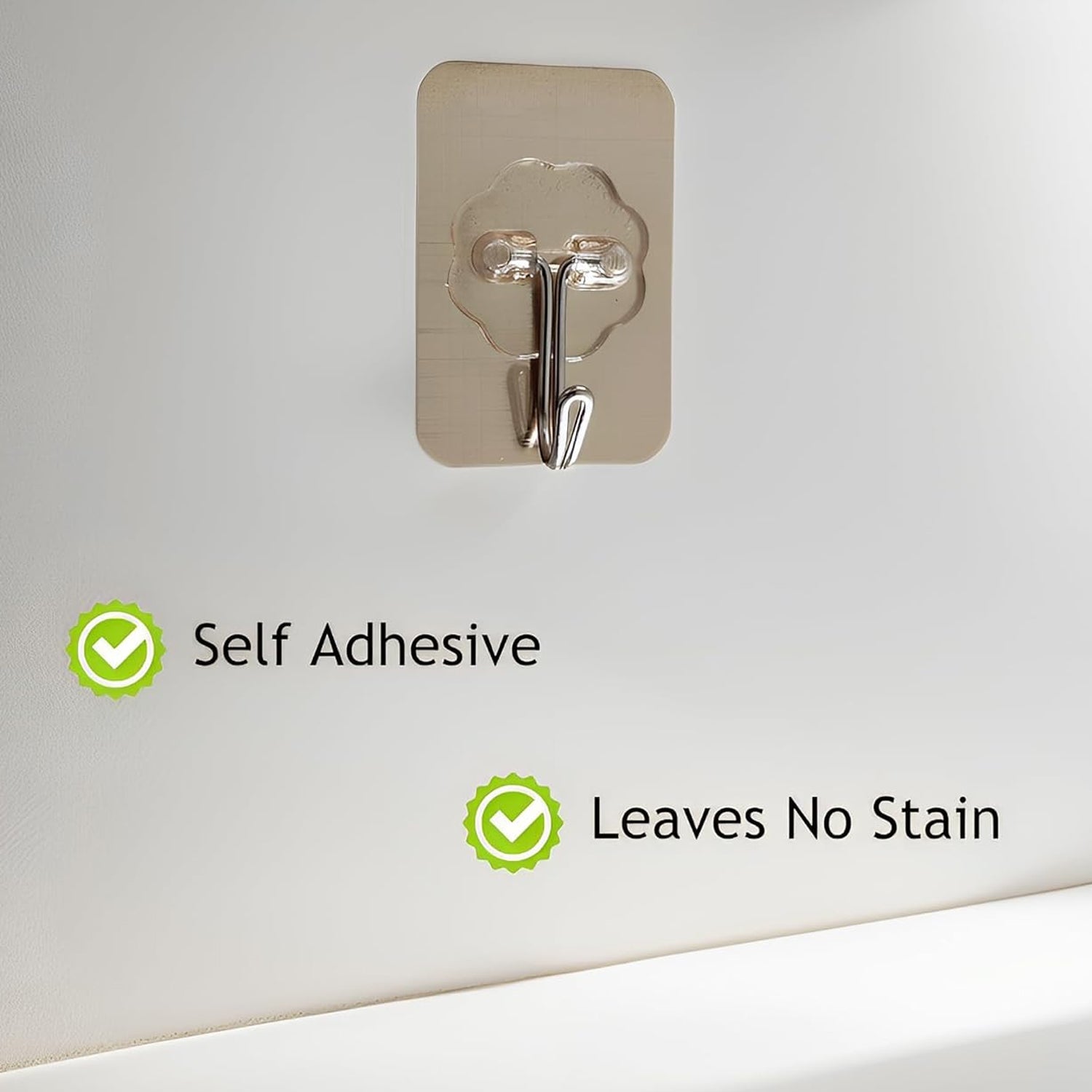 Close-up of reusable transparent wall hook adhesive for utility hanging