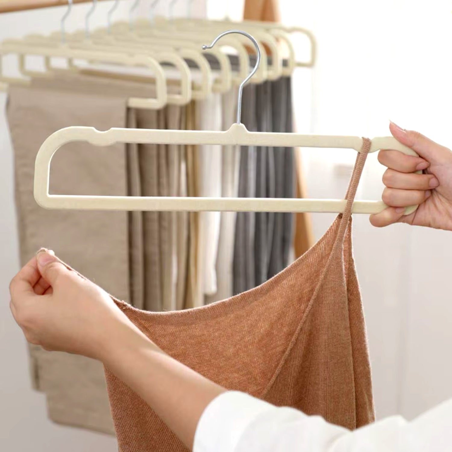 Close-up of velvet non-slip cloth hanger surface preventing clothes from slipping